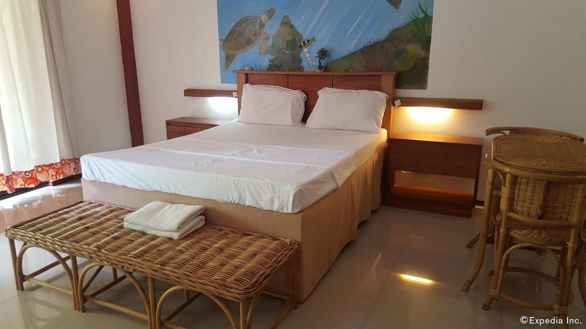 Cooper'S Beach Resort Lucbuan Bagian luar foto