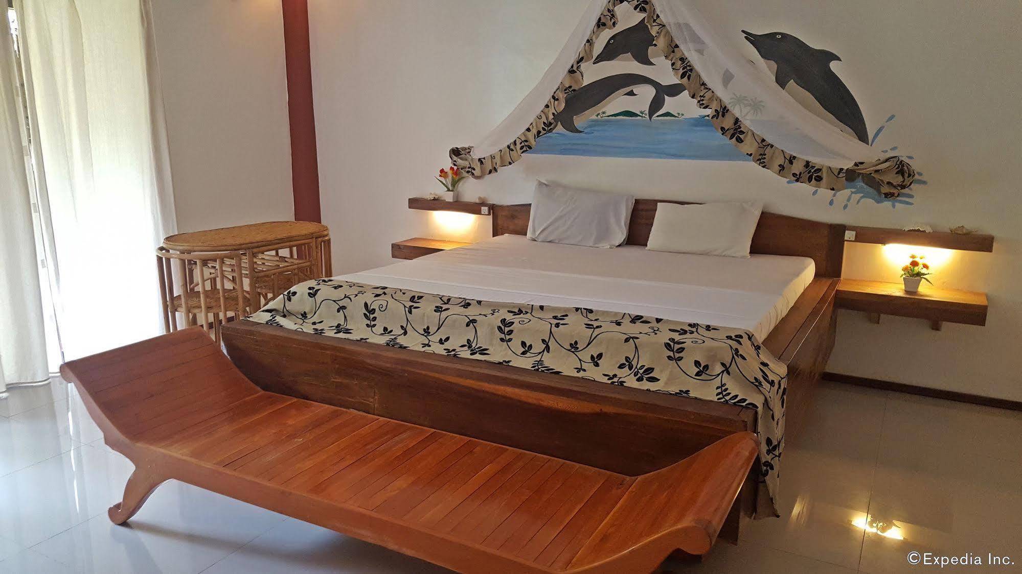 Cooper'S Beach Resort Lucbuan Bagian luar foto