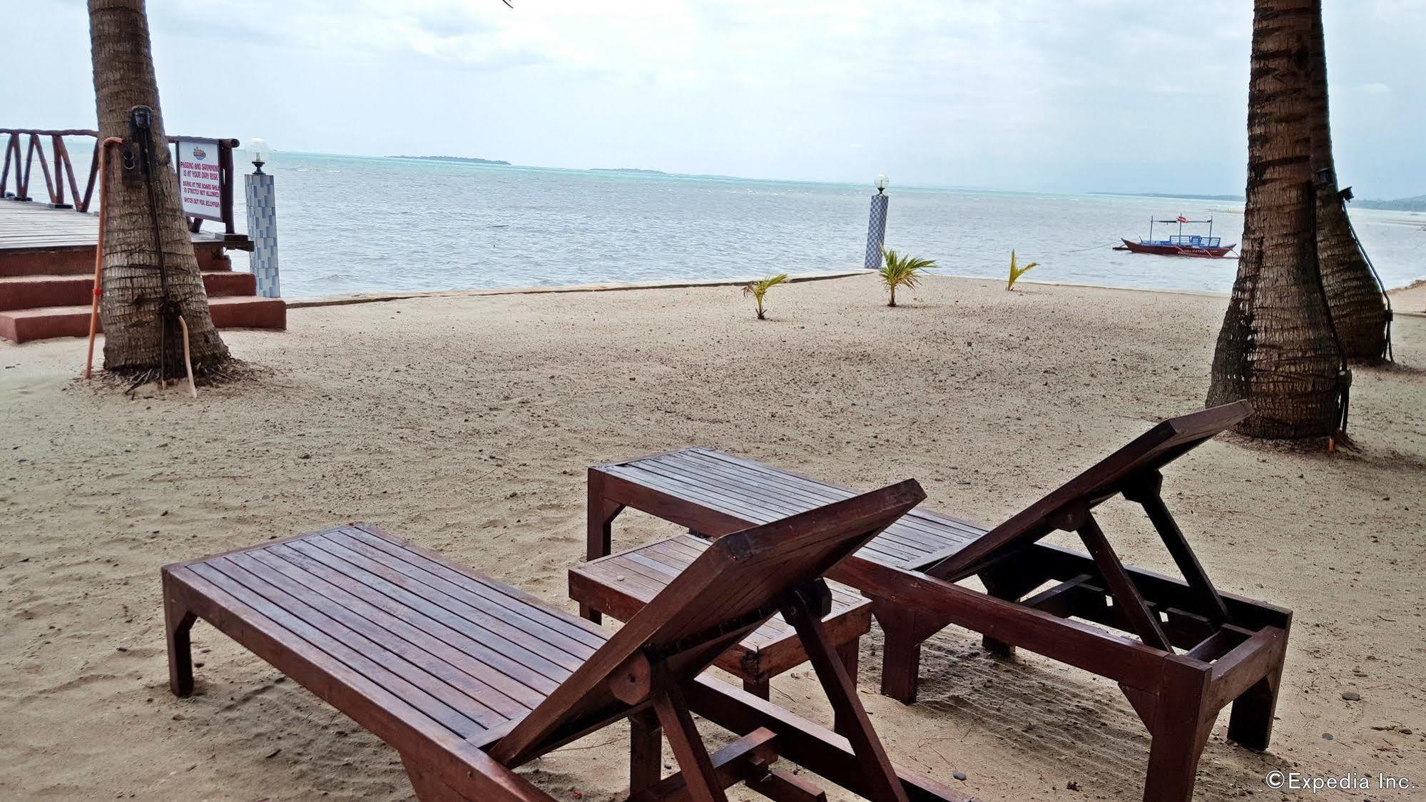 Cooper'S Beach Resort Lucbuan Bagian luar foto